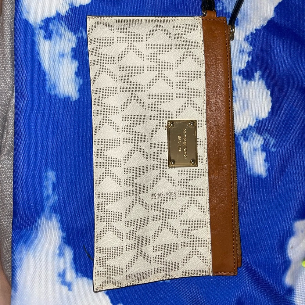 MK wristlet 10”x5 1/2”.